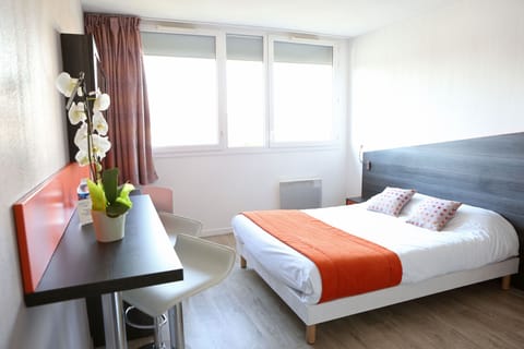 Get a peaceful night sleep in our cozy bedroom.