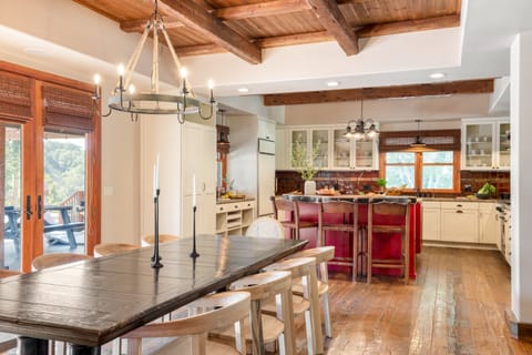 Dining table and kitchen.