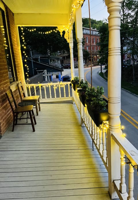 Private porch overlooking Main Street. Excellent atmosphere. Pure magic.