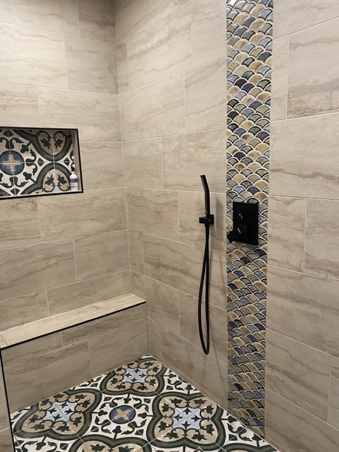 Combined shower/tub, hair dryer, towels, soap