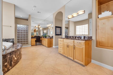 Bathtub, jetted tub, hair dryer, towels