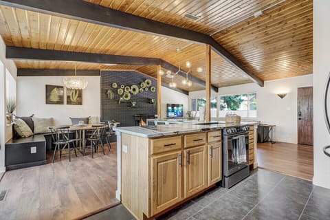 The open layout between the living room, kitchen, and dining room is perfect for large groups traveling together to enjoy each other's company.