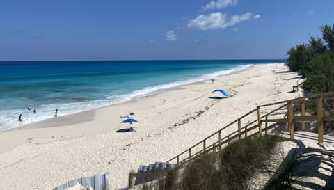 On the beach, sun loungers, beach towels