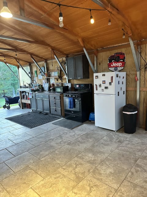 Outdoor kitchen- cups, plates, utensils, pots/pans,& cooking supplies provided
