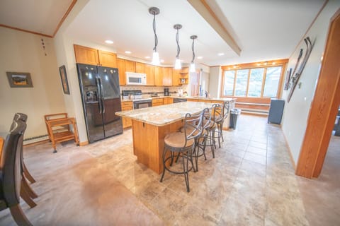 Updated kitchen with bar stool seating