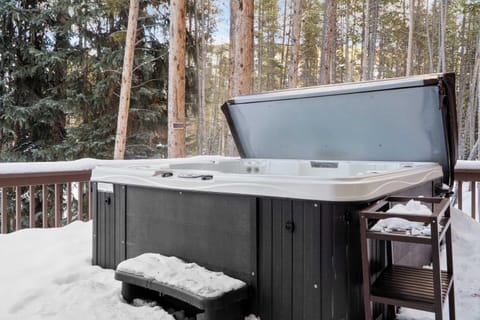 After a day out on the slopes or hiking trails ease sore muscles in the private 8-person hot tub.