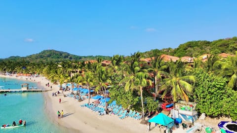 On the beach, sun loungers, beach towels