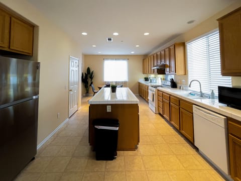 Our fully equipped kitchen with island layout. 