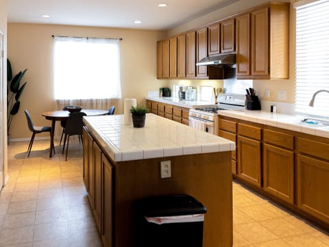 Our fully equipped kitchen with island layout. 