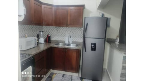 Coffee/tea maker, toaster, dining tables, kitchen islands