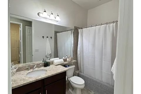 Combined shower/tub, hair dryer, towels, soap