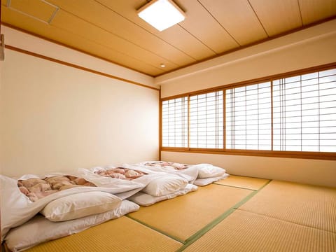 ・ An example of a Japanese-style room: Relax with a spacious tatami mat