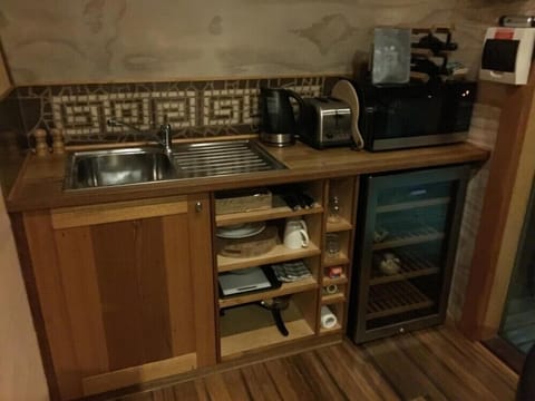 Fridge, microwave, toaster, dining tables