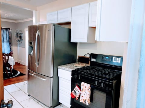 Refrigerator, Stove, Cabinets, Counter tops