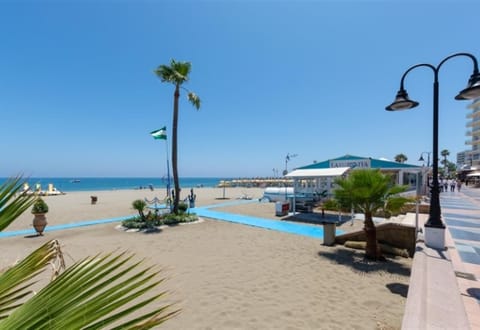 On the beach, beach towels