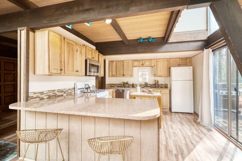 Barstool seating at the kitchen.