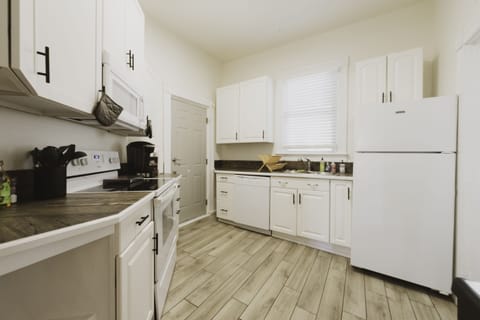 The upstairs kitchen is outfitted with all the basic essentials.