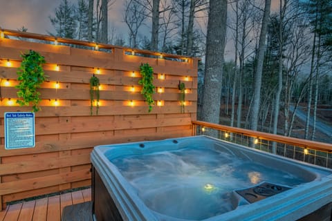 Soak under the stars with forest views and glowing lights - your private retreat