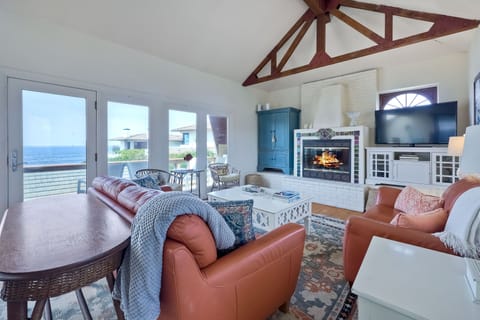 Upstairs living area with an ocean view