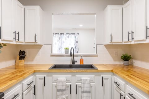 Fully stocked Kitchen with plenty of counter space.