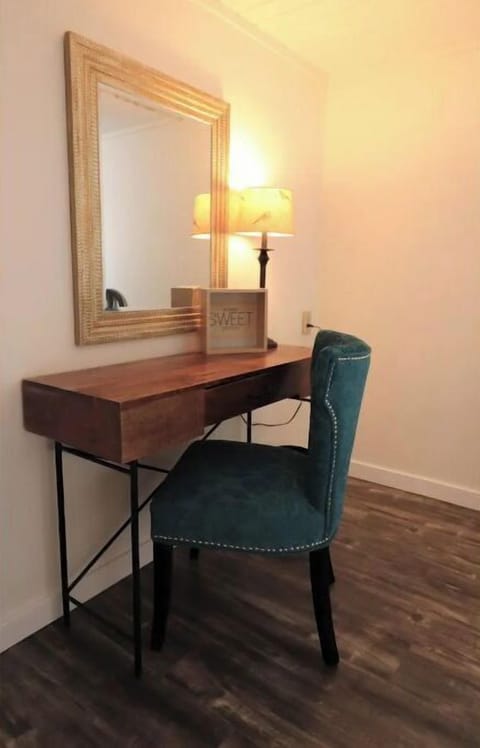 Bedroom 3 makes a great office space with a work desk or vanity