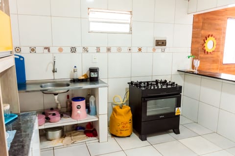 Fridge, stovetop, coffee/tea maker