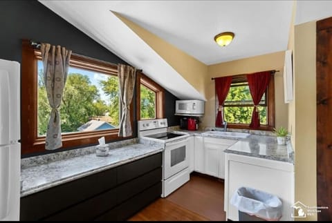 Complete kitchen with stove/oven, dishwasher, microwave and air-fryer