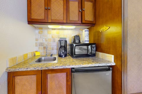 Microwave, coffee/tea maker, toaster, cookware/dishes/utensils