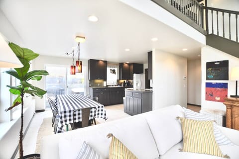 A great layout for cooking for friends -- the kitchen opens on to the dining room and living room