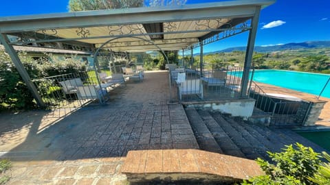 Outdoor pool, an infinity pool, sun loungers