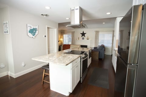 Large kitchen island with barstools.