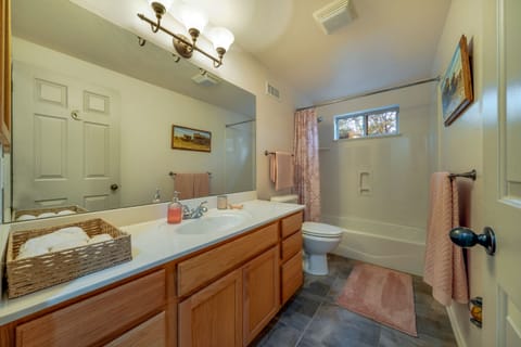 Combined shower/tub, hair dryer, towels, soap