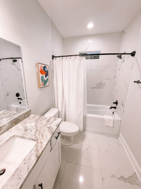 Combined shower/tub