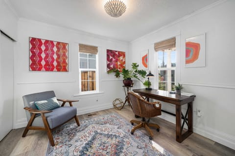 Cozy office off of the living room separated by french doors