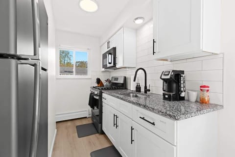 Everything is new in this sparkly clean kitchen with granite countertops.