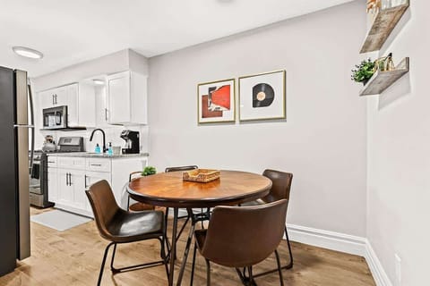 The table is the perfect size for a small group, and the chairs are comfortable and inviting.