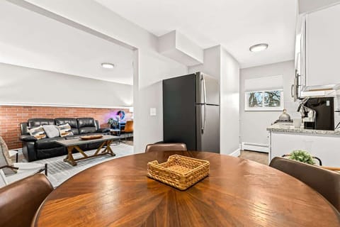 This kitchen is the perfect place to gather with friends and family for a potluck or game night.