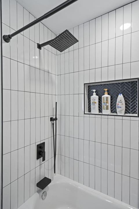 Combined shower/tub, hair dryer, towels, soap