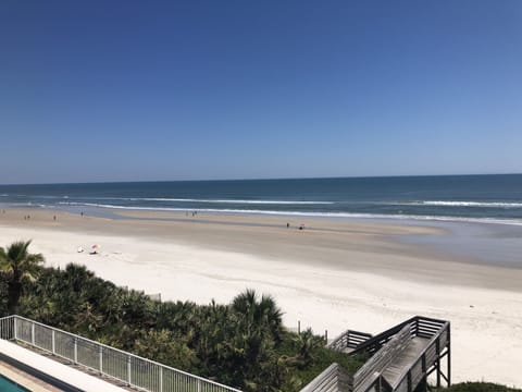 On the beach, sun loungers, beach towels