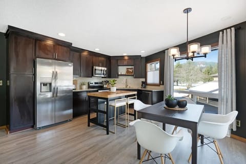 Loaded kitchen w/ fridge, microwave, stove, dishwasher, coffee pot, Keurig, etc