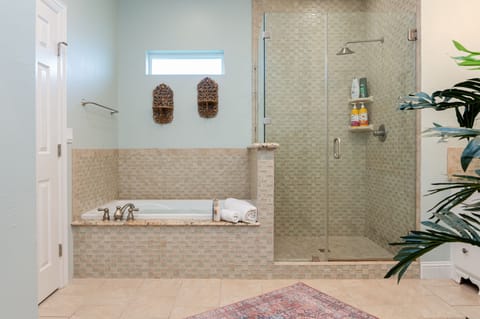 Combined shower/tub, hair dryer, towels, soap