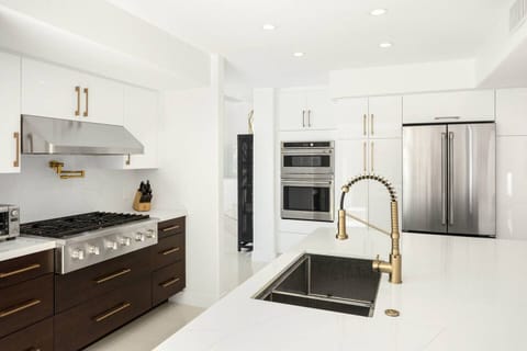 Full Chef's Kitchen with designer finishes and high end appliances