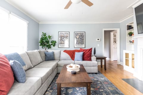 Living room with big, comfy pullout mattress (queen) couch and smart television.