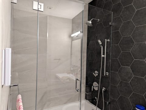 Combined shower/tub