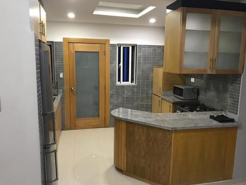 Private kitchen | Microwave, coffee/tea maker, toaster, dining tables