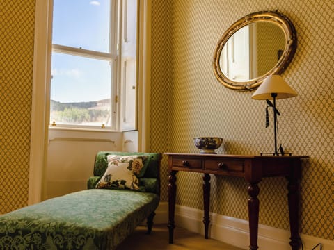 Peaceful sitting area looking out over estate | Dalnaglar Castle - Dalnaglar Castle And Cottages, Glenshee, Cairngorms