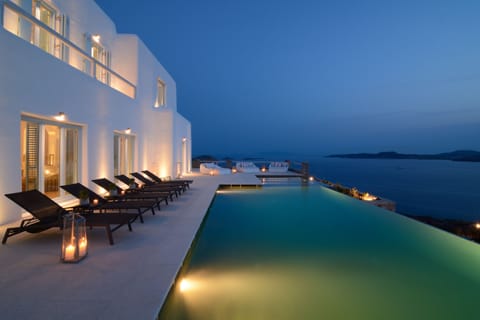 Outdoor pool, an infinity pool, sun loungers