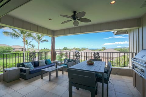 Large upstairs lanai with ample seating and gas BBQ. Ocean and mountain views.
