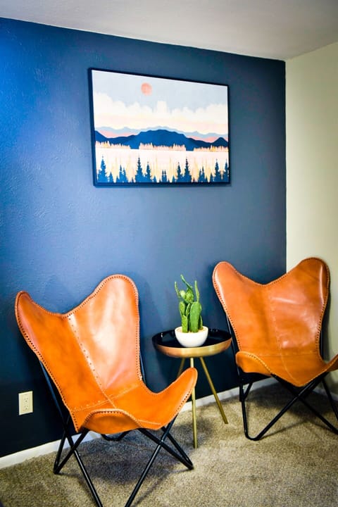 Bedroom 4 with king bed and sitting area