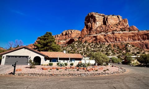 Beautiful blue sky with Castle Rock right behind the house!